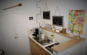 Kuchyň nebo kuchyňský kout v ubytování Zuppetta16 Apartments