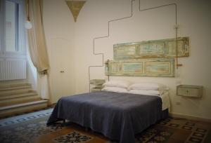 Postel nebo postele na pokoji v ubytování Zuppetta16 Apartments