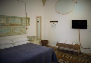 Postel nebo postele na pokoji v ubytování Zuppetta16 Apartments