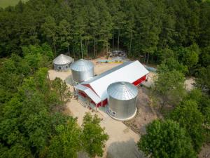 an overhead view of a building with two silos at Hermann Grain Bins BNB Entire Complex sleeps 16 in Hermann
