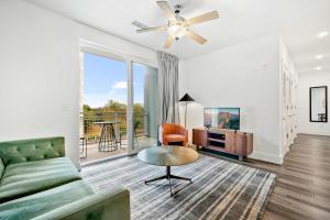 a living room with a couch and a table at 2B2B with Private Balcony Modern & Stylish - 2B4 in Atlanta