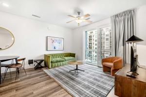 a living room with a couch and a table at 2B2B with Private Balcony Modern & Stylish - 2B4 in Atlanta