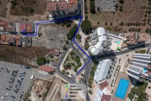 an overhead view of a city intersection with a road at Casa do Luiz in Lisbon