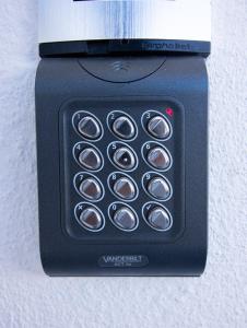 a black cell phone with many buttons on it at Casa do Luiz in Lisbon