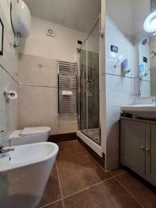 a bathroom with a sink toilet and a shower at Portella delle Fate in Sora +34 photos
