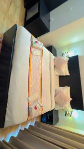 a large mattress on display in a store at Vrindavan suites omex in Vrindāvan