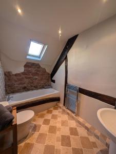 a bathroom with a toilet and a sink at The Farmhouse in Teignmouth +72 photos