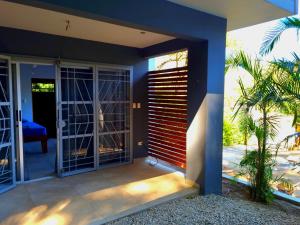a view of a house with a pivot door at Casa Celeste in Playa Pelada