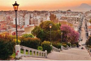 a view of a city with a street with a street light at elia patra apartment 2 in Patra