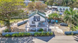 an overhead view of a white house in a city at Charming Studio by Sandy Beach - Affordable & Private in Rincon +14 photos