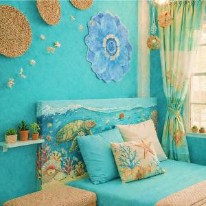 a bedroom with a blue wall with a blue couch at Crieta Costello Homestay in San Juan