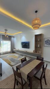 a dining room with a table and chairs in a room at Tranquil Ridge BnB in Blantyre