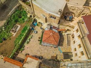 an overhead view of a building with a roof at Atilla's Cave Hotel in Nevşehir