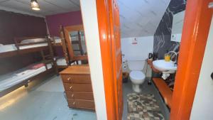 a small bathroom with a toilet and a sink at COACHHOSTEL7 in São Paulo +45 photos