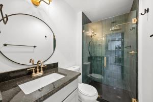 a bathroom with a sink and a shower at Park Hotel Studio Suite 203 in Chattanooga