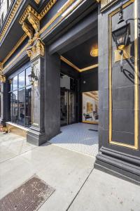 an entrance to a building with a large glass door at Park Hotel Studio Suite 203 in Chattanooga +6 photos