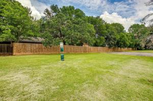 a tree in the middle of a yard at Denton pad with 2BR comfort in Denton