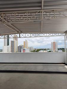 an empty building with a view of a city at Margem do São Francisco 104 praiano in Petrolina
