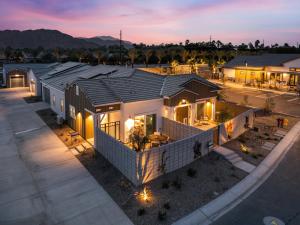 an aerial view of a home at dusk at Summerwell by AvantStay in La Quinta