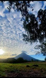 a view of a mountain in the distance at La inculta hostel Ometepe in Santo Domingo +36 photos