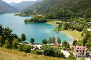 an aerial view of a lake in a valley at Apartments in Pieve di Ledro - Ledrosee 22645 in Ledro +12 photos