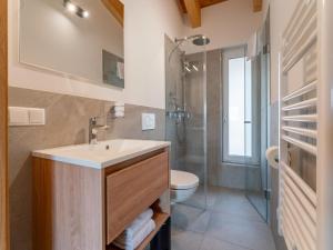 a bathroom with a sink and a toilet at Grebenzen Lodges 49B in Sankt Lambrecht +56 photos
