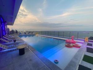 a swimming pool on the top of a cruise ship at 서프리조트 양양 빅웨이브 in Yangyang
