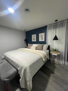 a bedroom with a large bed in a room at Beautiful house in Augusta in Augusta