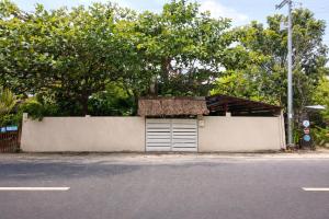 a building on the side of a street at Sleepy Gypsea Villa Siargao in Siargao Island