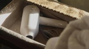 a box with a wii remote control in it at Sleepy Gypsea Villa Siargao in Siargao Island