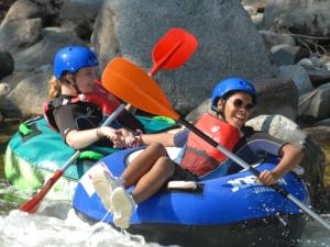 two people in a raft in the water at Chalet 4 Pers - Terrasse - API-1-52-1751 in Espira-de-Conflent