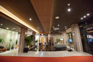 a lobby of a building with a waiting room at Hotel The Star in Yeonggwang