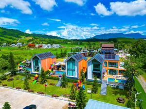 an aerial view of a village with houses at MK Land Pool Villa Khaokho in Khao Kho