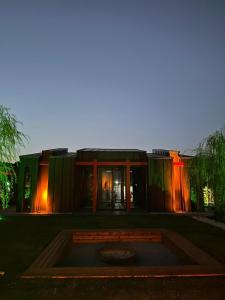 a building with a fountain in front of it at Baraka Suite in İznik