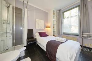 Voodi või voodid majutusasutuse B&B Zinnen en Minnen toas