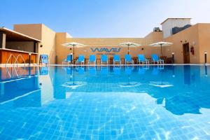 Bazen u ili blizu objekta Asma Hotel Al Barsha