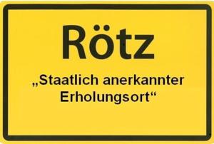 a yellow sign with the words rozstakrit istg at Ferienwohnung "Ausblick" in Rötz