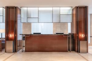 a kitchen with a bar in a building at Crown Park Hotel Seoul Myeongdong in Seoul
