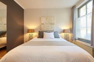 Voodi või voodid majutusasutuse B&B Zinnen en Minnen toas