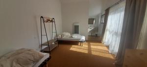 a bedroom with a bed and a ladder in a room at YonShala in Garrosse +55 photos