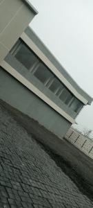 a building with a window on the side of it at Amol resort in Vidisha