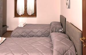 a room with a bed and a bed frame at Residence Il Casolare in Piedimonte San Germano