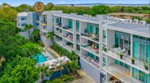 an aerial view of a building with a swimming pool at Sapphire Heaven in Woorim