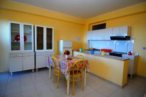 Η κουζίνα ή μικρή κουζίνα στο Appartamenti Del Sole