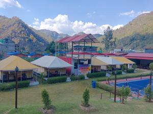 an aerial view of a resort with a pool at Down Valley Resort in Rishīkesh