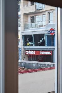 a view of a building from a window at aifoS in Xanthi