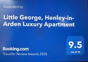 a sign that says little georgehelleley in an open luxury appointment at Little George, Henley-in-Arden Luxury Apartment with Private Parking in Henley in Arden