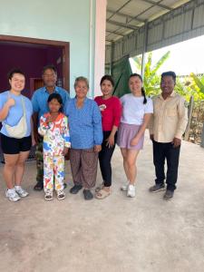 a group of people posing for a picture at Angkor Nature Voyages in Phumi Ta Phul