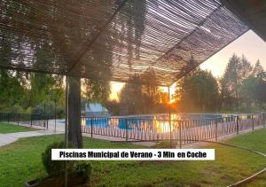 a pavilion with a tennis court in a park at Ruralux Aroche in Aroche