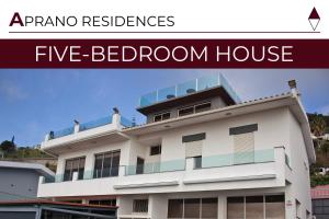 a large white building with the words five bedroom house at Atlantic View Residence in Funchal